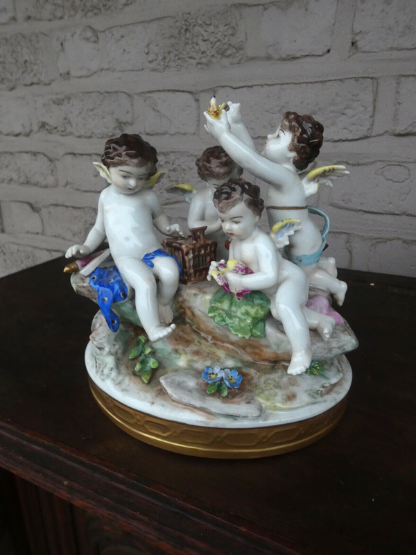 Antique German Volkstedt marked porcelain putti cherub figurine bir group statue