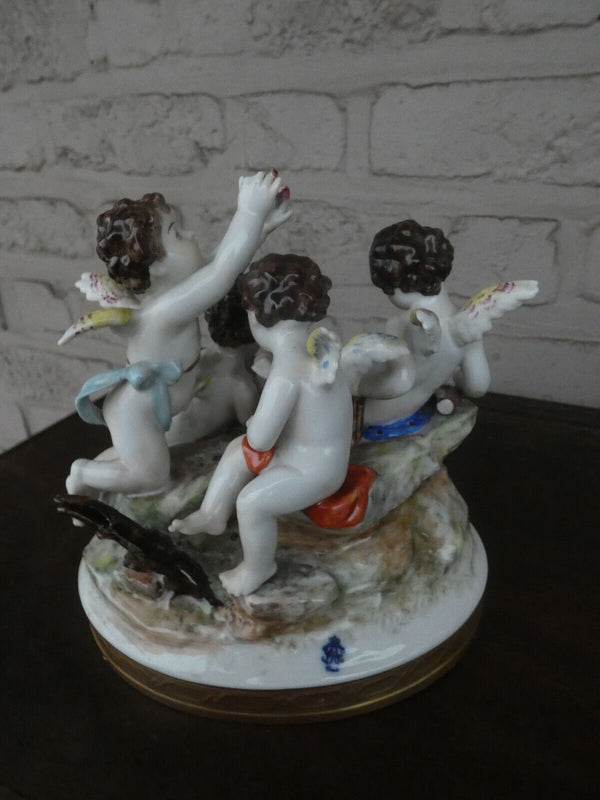 Antique German Volkstedt marked porcelain putti cherub figurine bir group statue