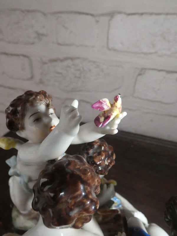 Antique German Volkstedt marked porcelain putti cherub figurine bir group statue