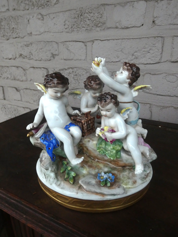 Antique German Volkstedt marked porcelain putti cherub figurine bir group statue