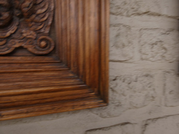 pair antique 19thc wood carved putti cherub head portrait plaque wall