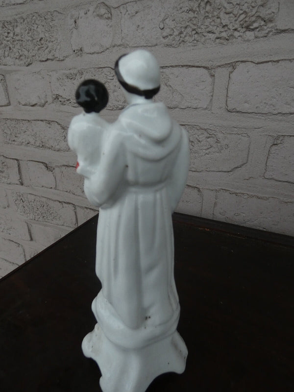 Antique vieux paris porcelain saint anthony with child statue