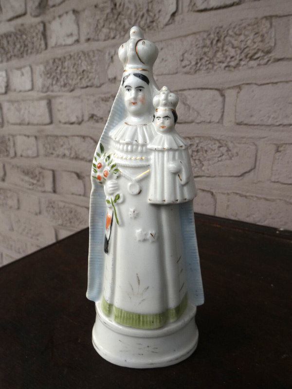 Antique porcelain statue madonna