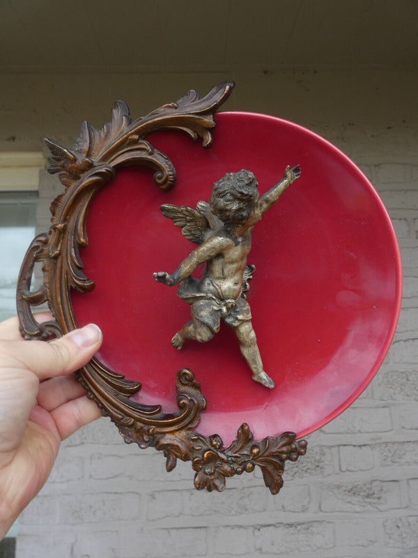 Vintage Red porcelain plate with spelter bronze putti figurine frame 1950